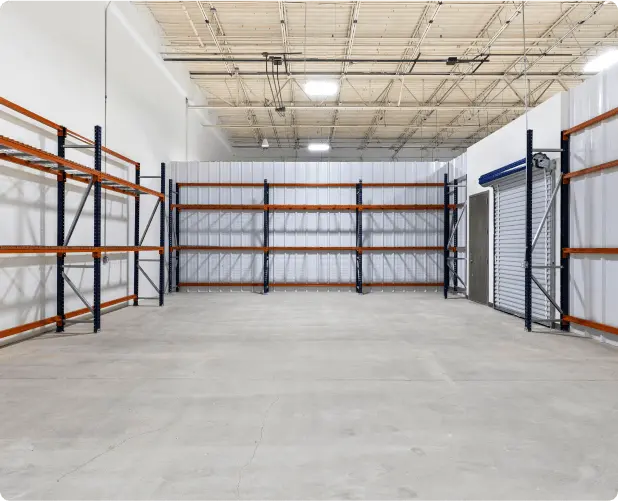 Private WareSpace unit lined with orange and blue industrial racking